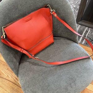 NEW -Calvin Klein Orange Reversible Tote Bag
With Pouch